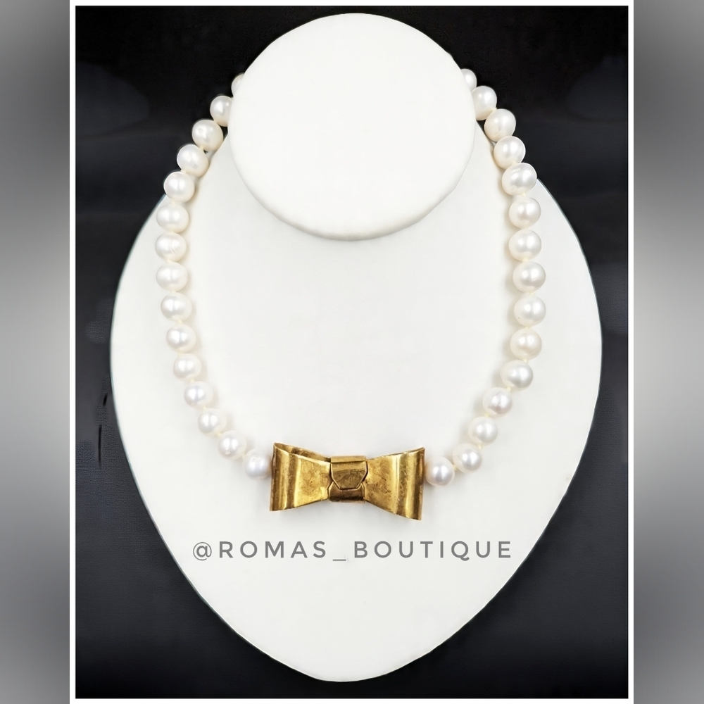 Pearl and gold tone bow necklace with CP For Cultured Pearls
